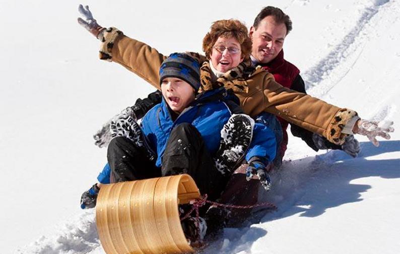 Tobogganing at New Earth Estate